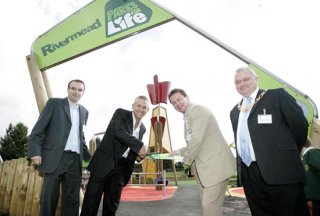 Gary Lineker and local delegates cutting the ribbon to officially open the park.